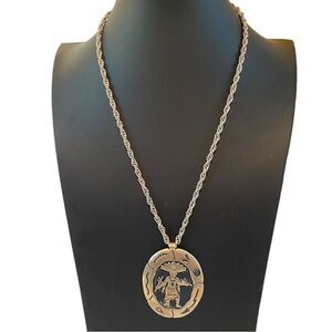 Nickel Silver Native American Themed Pendant on Silver Toned Rope Chain.